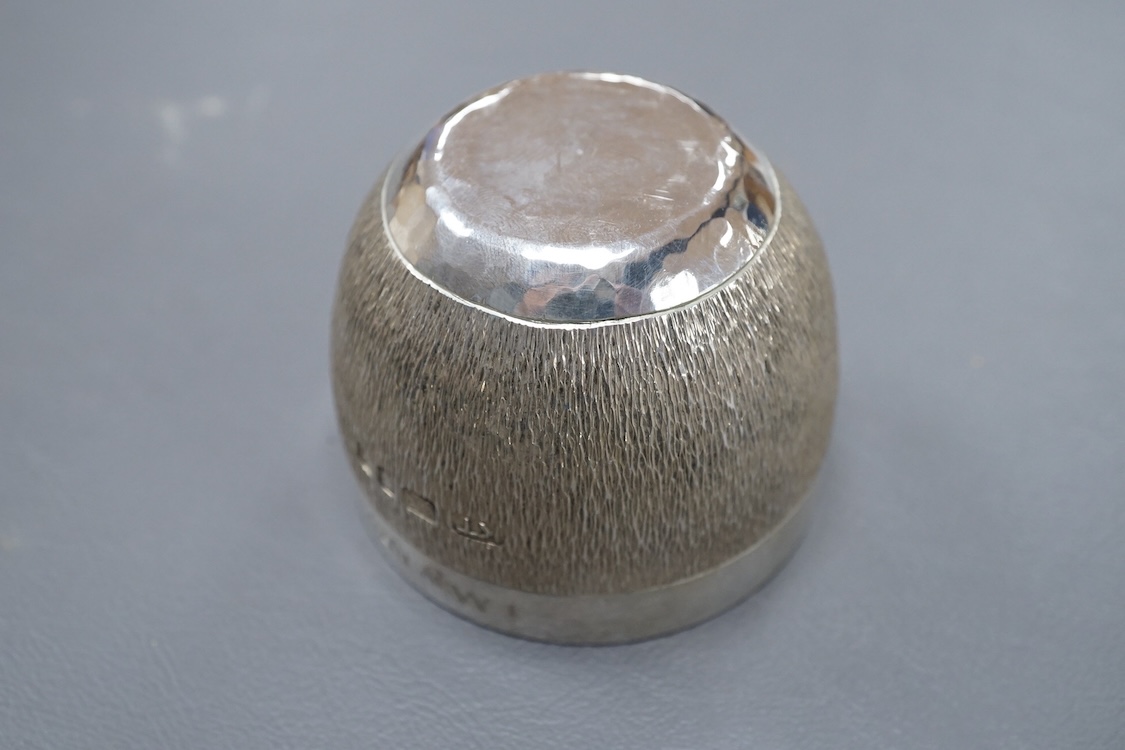An Elizabeth II textured silver tumbler cup, possibly by Keith Tyssen, London, 1975, with later engraved inscription, height 50mm, 136 grams.